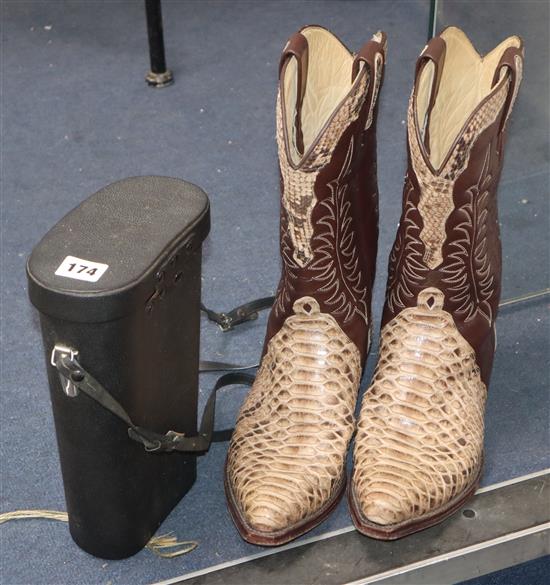 A pair of Gentlemans Cobra skin and leather cowboy boots, and a pair of binoculars